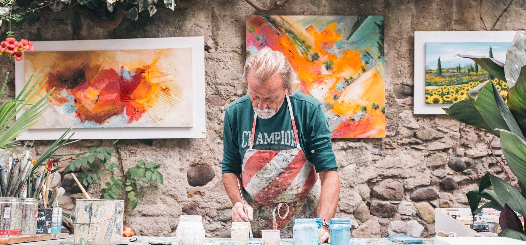 Allia Future Business Centre | Artist man painting outdoors